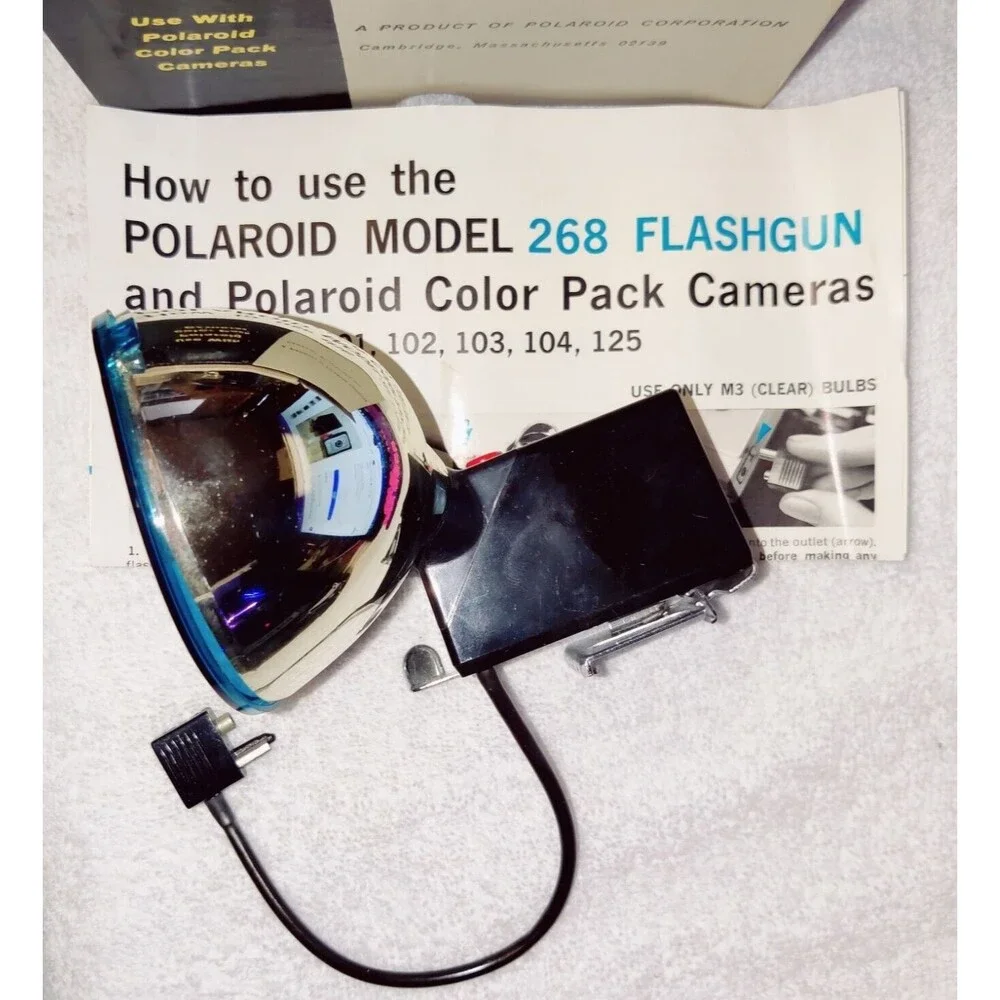 VINTAGE POLAROID FLASHGUN #268 WITH BOX AND MOUNTING POINTS & CLIP
